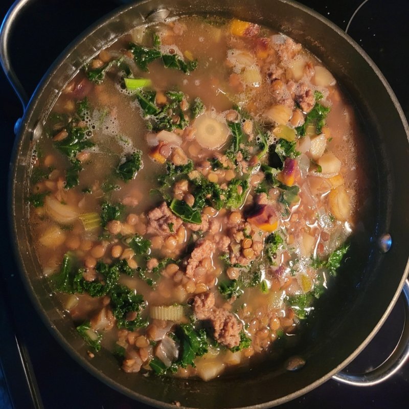 Ginger curry lentil soup with fresh kale