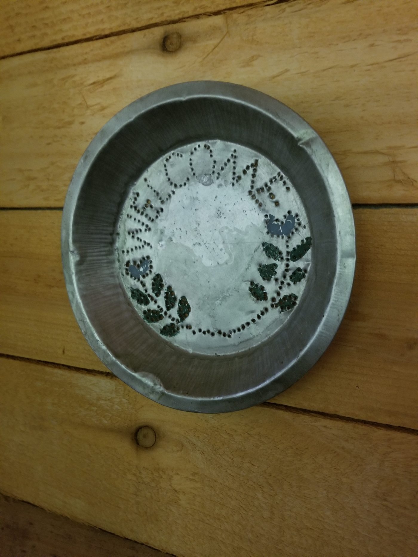 Reid's 3rd grade Mother's Day gift — Welcome Home tin at Butterthief Gardens
